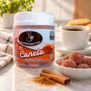 Bala de Canela Karpinski 120 g — ao lado de mesa de café da tarde