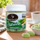 Bala de Cidreira Karpinski 120 g — ao lado de mesa de café da tarde
