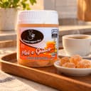 Bala de Mel e Guaco Karpinski 120 g — com café servido em bandeja