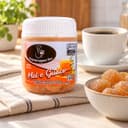 Bala de Mel e Guaco Karpinski 120 g — ao lado de mesa de café da tarde