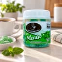 Bala de Menta Karpinski 120 g — ao lado de mesa de café da tarde