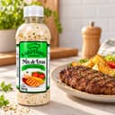 Sal Fino Temperado com Ervas Karpinski 500 g — ao lado de carne grelhada