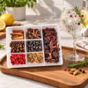 Kit Meu Gin Gourmet Karpinski — ao lado de bebida de tônica em bandeja