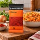 Tempero Colorau em Sachê Karpinski 50 g — no preparo com arroz cozido