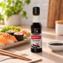 Molho Shoyu Tradicional Karpinski 60 ml — ao lado de refeição salgada