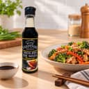 Molho de Soja Premium Karpinski 150 ml — ao lado de refeição salgada
