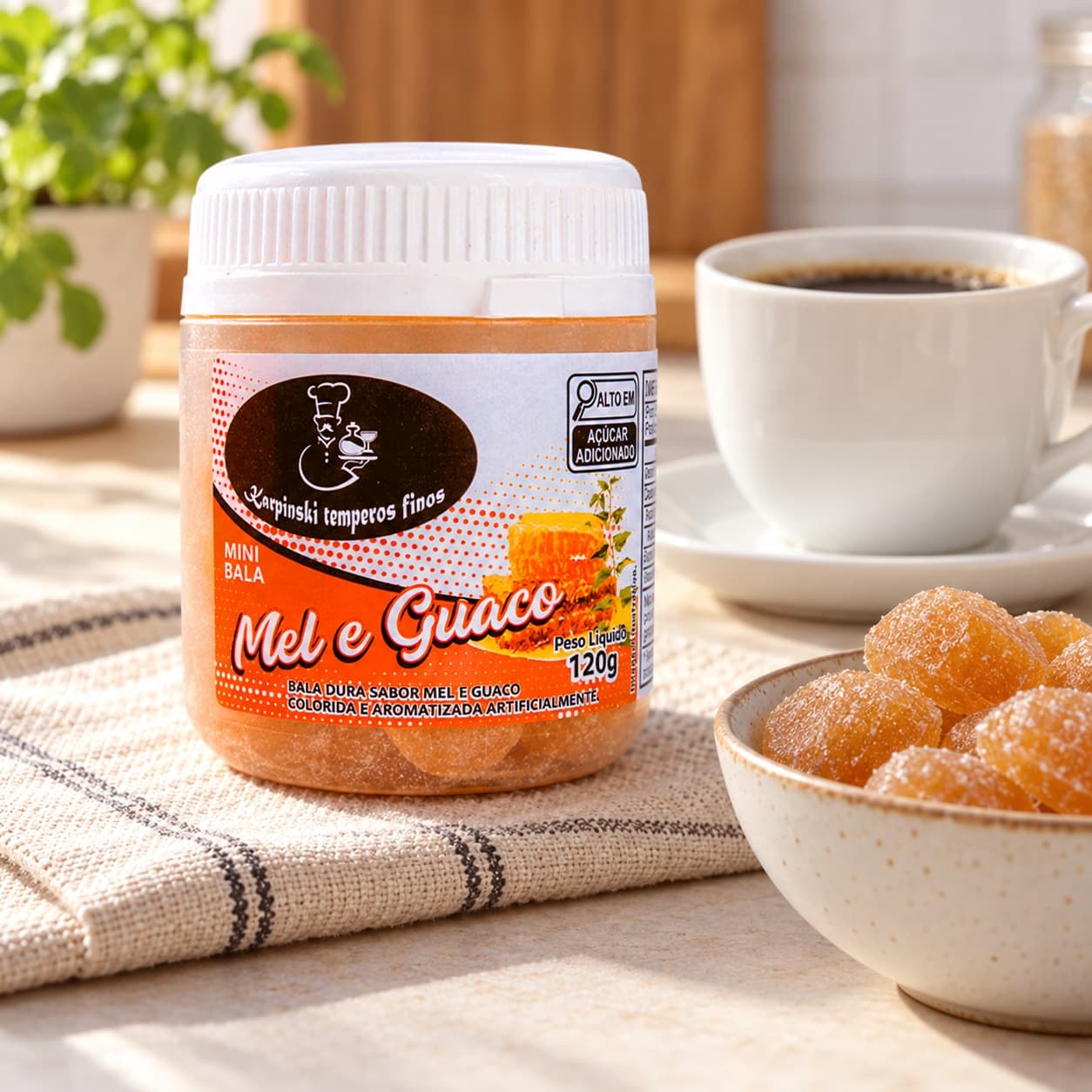 Bala de Mel e Guaco Karpinski 120 g — ao lado de mesa de café da tarde